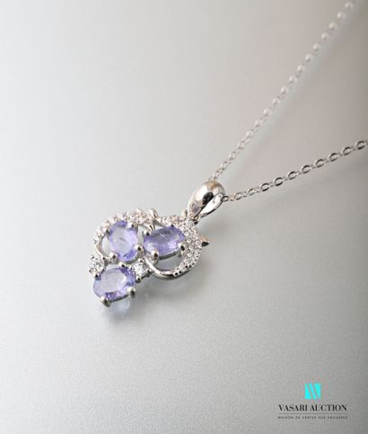 null Oval silver link chain and a poly-lobed pendant set with oval tanzanites and...