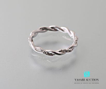 null Wedding band in 750 thousandths white gold decorated with two interlaced lines,...