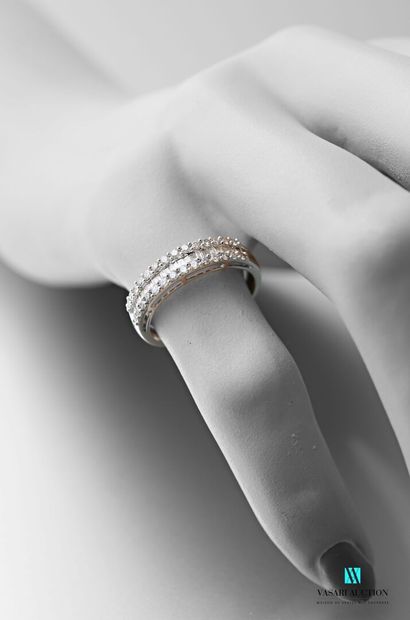 null Half wedding band in 750 thousandths white gold decorated in its centre with...