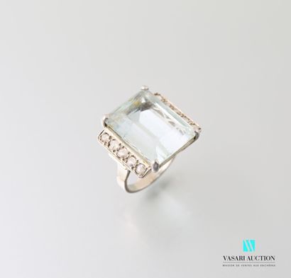 null Art Deco ring in 750 thousandths white gold set with an emerald-cut aquamarine...