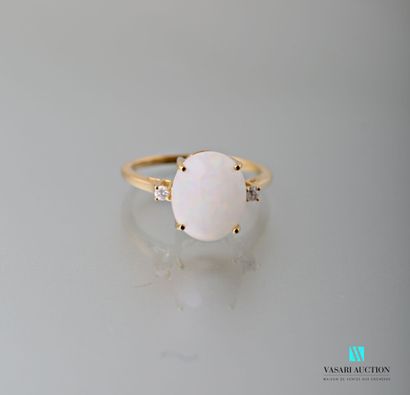 null Vermeil ring set with a cabochon opal calibrating approximately 2 carats and...