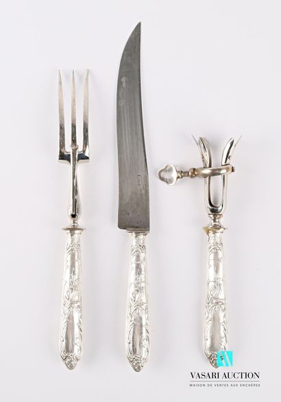 null Service set comprising a carving service cutlery and a leg of lamb handle, the...