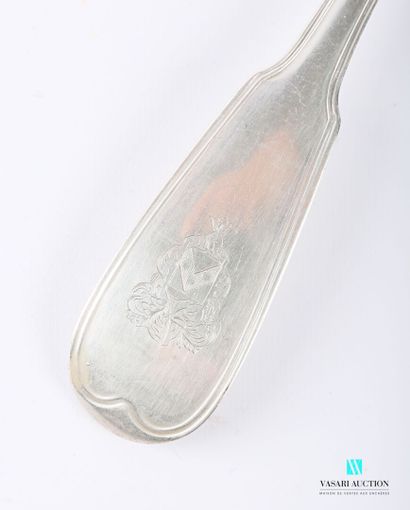 null A silver ladle (1819-1838), the handle decorated with fillets and finished with...
