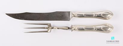 null Cutlery service cover, the silver handle filled with fillets and decorated with...