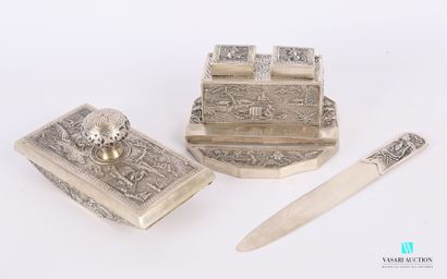 n Silver desk set with fishermen in sinister landscapes including an inkwell, a paper...