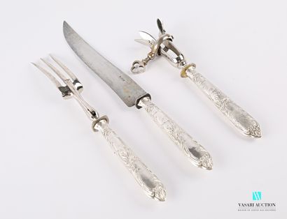 null Service set comprising a carving service cutlery and a leg of lamb handle, the...