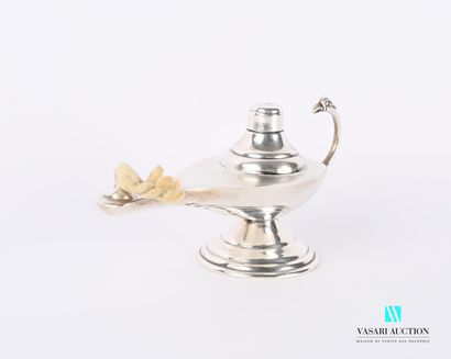 null Oil lamp in silver 900 thousandths laying on a pedestal base, the plug in winding...