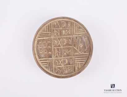 null A light-coloured wooden seal with a cruciform motif carved by the monks of Mount...