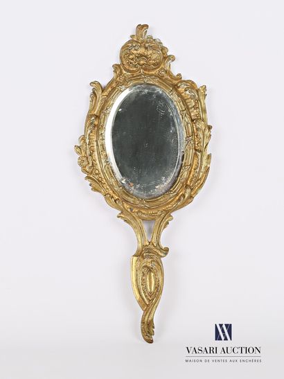 null Face to hand in bronze, the bevelled oval mirror is set in a medallion decorated...