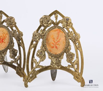 null Pair of gilded and varnished metal frames in ogival shape with openwork decoration...
