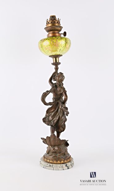 null Oil lamp resting on a grey veined marble base, the shaft in ruler with brown...