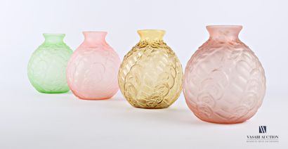 null Set of four glass vases in pink, green and amber with an ovoid shape decorated...
