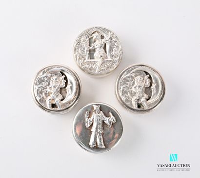 null Set of four round pillboxes in silvery metal with Pierrots.

Top. 2 cm Diameter...