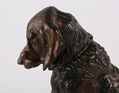 null Bronze subject representing a sitting spaniel

(small slit)

High. 17 cm - Width:...