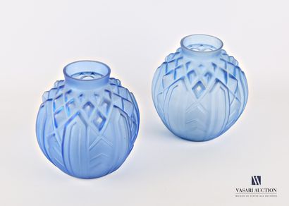null Pair of moulded blue glass vases with geometric pattern decoration

Monogrammed...