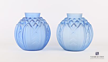 null Pair of moulded blue glass vases with geometric pattern decoration

Monogrammed...