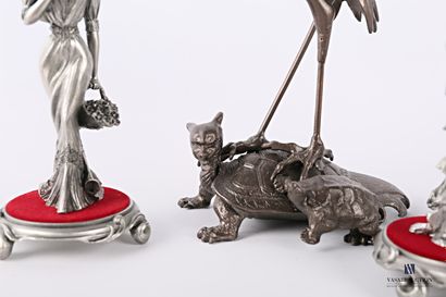 null Set of four pewter subjects representing elegant pieces from the Frou-Frou collection...