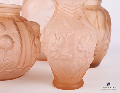null Set of seven moulded glass vases tinted pink with birds, fishes and stylised...
