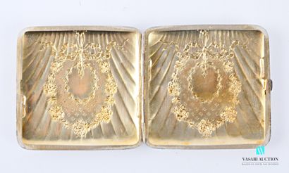 null Square cigarette case in silver, the dishes decorated with a floral wreath and...