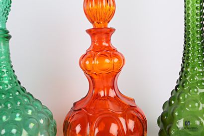 null Set of seven carafes of various shapes in amber, blue, green and red tinted...