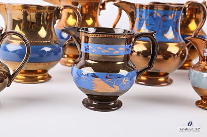null JERSEY

Copper-glazed earthenware set with blue bands, some with stylised foliage...
