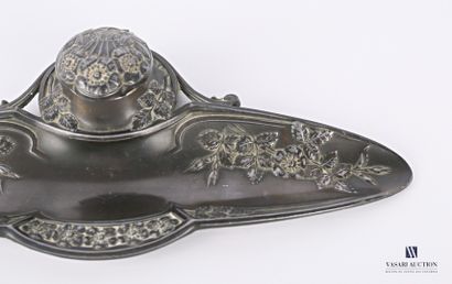 null Inkwell in shuttle-shaped ruler with decoration of flowered branches in recall...