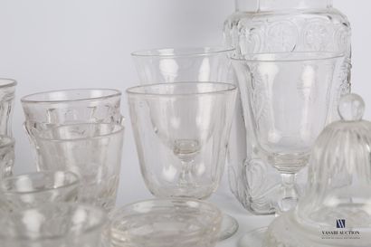 null Transparent glass set consisting of a moulded glass jar decorated with scrolls...
