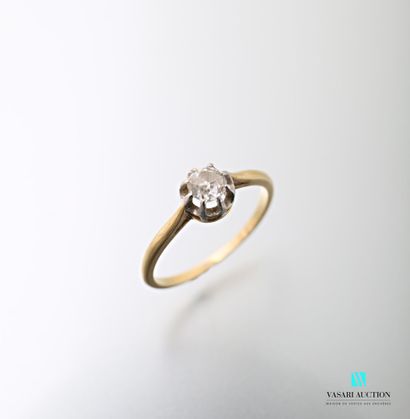 null 750 thousandths yellow gold ring set with an antique cut solitaire diamond of...