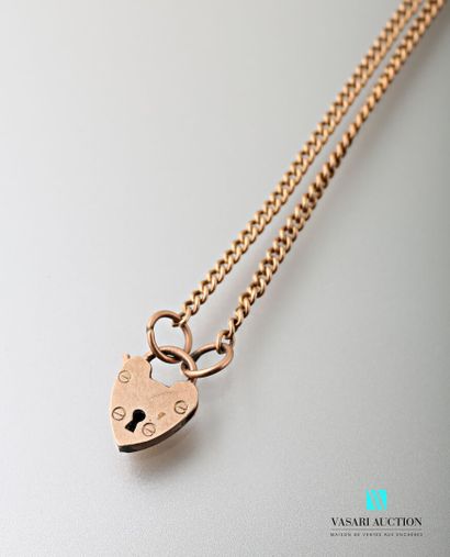 null Small 375 thousandths (9 carat) gold chain with a heart shaped lock, English...