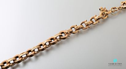 null Yellow gold bracelet 750 thousandth round links alternating with oval guilloché...