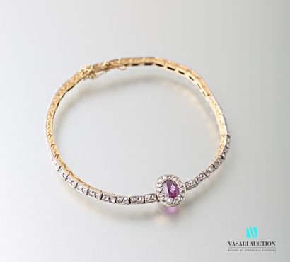 null Supple bracelet in 585 thousandths gold paved with rose-cut diamonds, central...