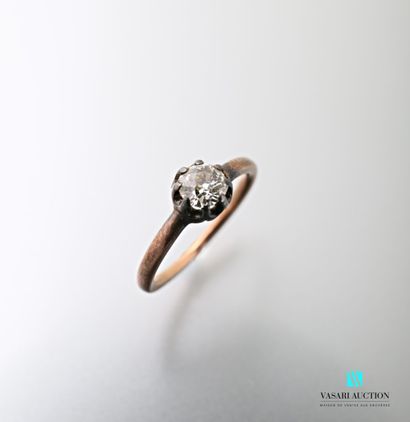 null 750 thousandths rose gold ring set with an antique cut solitaire diamond of...