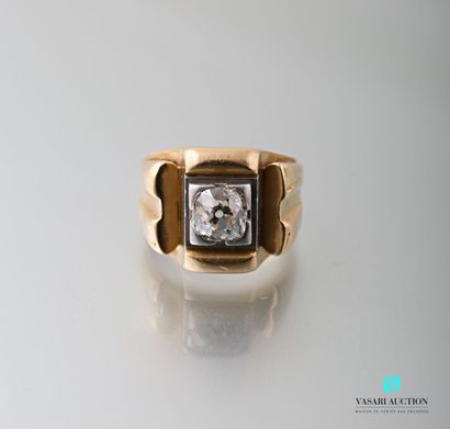 null 750 thousandths yellow gold signet ring set with an antique cut diamond of approximately...