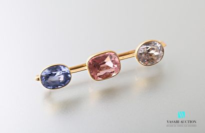 null 
Brooch barrette brooch in 750 thousandths yellow gold set with three gemstones:...