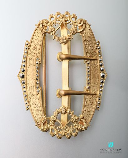 null Late 19th century gold-plated oval belt buckle decorated in the Louis XVI style...