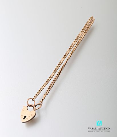 null Small 375 thousandths (9 carat) gold chain with a heart shaped lock, English...