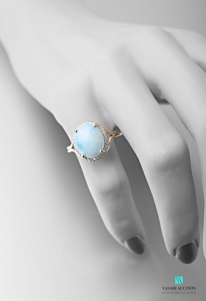 null 925 sterling silver ring set with a central blue hard stone surrounded by white...