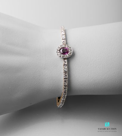null Supple bracelet in 585 thousandths gold paved with rose-cut diamonds, central...