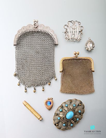 null A silver purse in silver mesh decorated with six small pearls, boar's head punch...