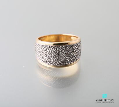 null 750 thousandths yellow gold rush ring decorated with a pavement of small diamonds...