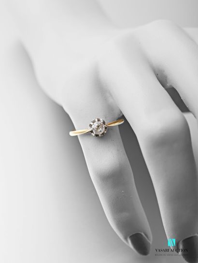 null 750 thousandths yellow gold ring set with an antique cut solitaire diamond of...