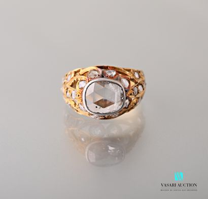 null 750 thousandths yellow gold dome ring set with a rose-cut diamond in the centre...