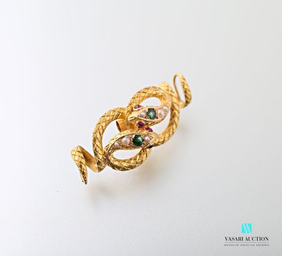 null Part of 750 thousandths yellow gold jewelry formed of two snakes facing each...