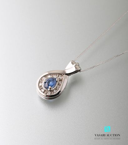 null A 750-thousandth white gold chain with a pear-shaped pendant decorated with...