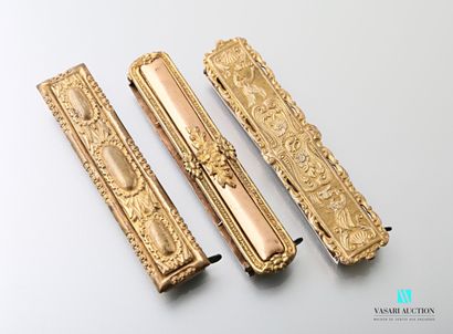 null Three Napoleon III gold-plated rectangular belt buckles decorated with flowers,...