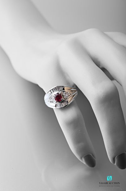 null Ring in platinum 900 thousandths set in its center with a Burmese ruby certified...