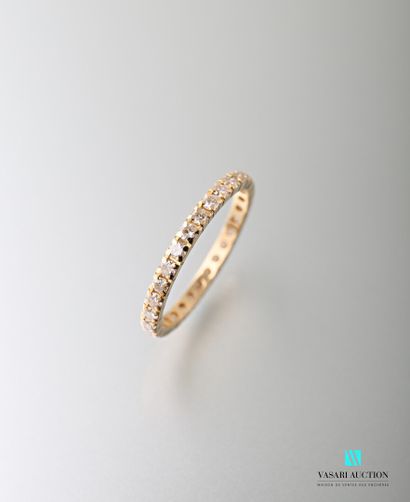 null American wedding band in 750 thousandths yellow gold set with 29 brilliants...