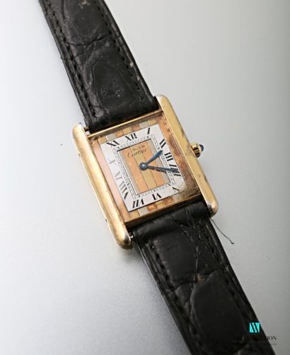 null Cartier, men's wristwatch, Tank model in 925 thousandths vermeil, the dial in...
