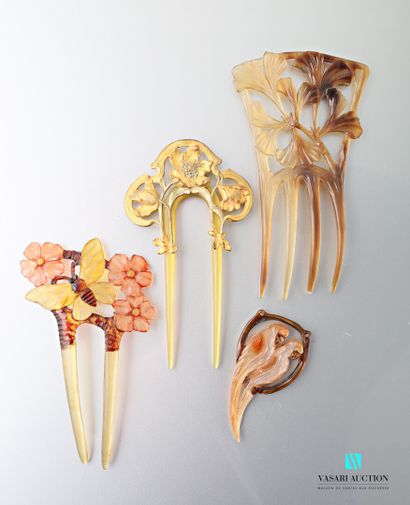 null Three horn-shaped celluloid combs with floral and vegetal decoration, one Art...