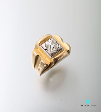 null 750 thousandths yellow gold signet ring set with an antique cut diamond of approximately...